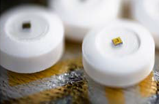 Edible sensor for electronically confirming adherence to oral medications.